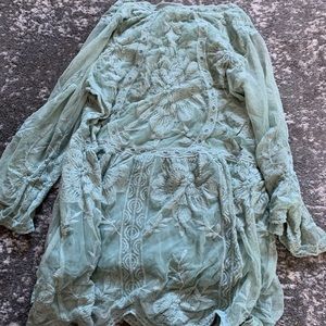 Green lace top with sheer arms